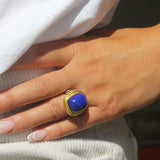 Cushion Cut Cabochon Lapis Ring with Blue Sapphire Triads