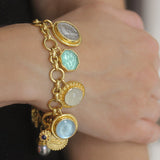 Charm Bracelet With a Selection of Venetian Glass Intaglios, White & Black South Sea Pearls, Ancient Silver and Bronze Coins