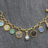 Charm Bracelet With a Selection of Venetian Glass Intaglios, White & Black South Sea Pearls, Ancient Silver and Bronze Coins
