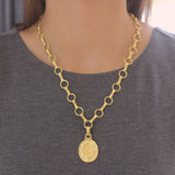 Gold "Crane" Pendant with Diamonds and Flat-Rimmed Bezel