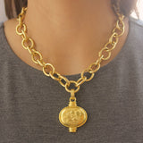 Horizontal Oval Gold "Sailing Cherub" Pendant