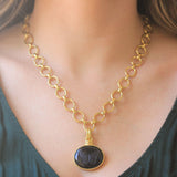 Onyx "Moth" Seal Pendant With Topknot and Hinged Banded Bale