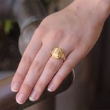 Octagonal Gold "Cherub with Flute" Ring with Diamonds Triads