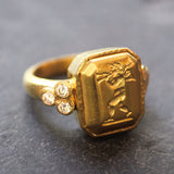 Octagonal Gold "Cherub with Flute" Ring with Diamonds Triads