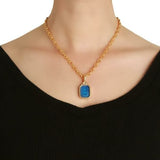 Cerulean Venetian Glass Intaglio "Small Centaur" Pendant with Cabochon Moonstone