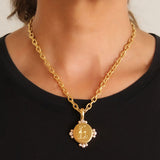 Gold Vertical Oval "Stag" and Diamond Pendant with Hinged Bale