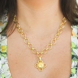 Gold Round "Fat Bee" Pendant with wire arches and gold dots on hinged bale
